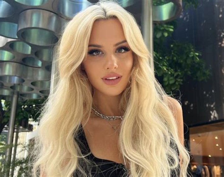 Blair Walnuts in Bathing Suit Says "Feathers Forever” — Celebwell