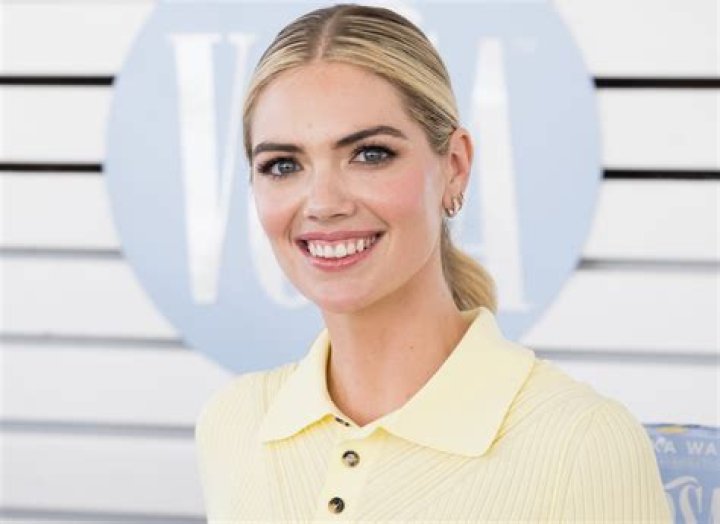 Kate Upton in Workout Gear Does “Kate Du Soleil” Aerial Yoga