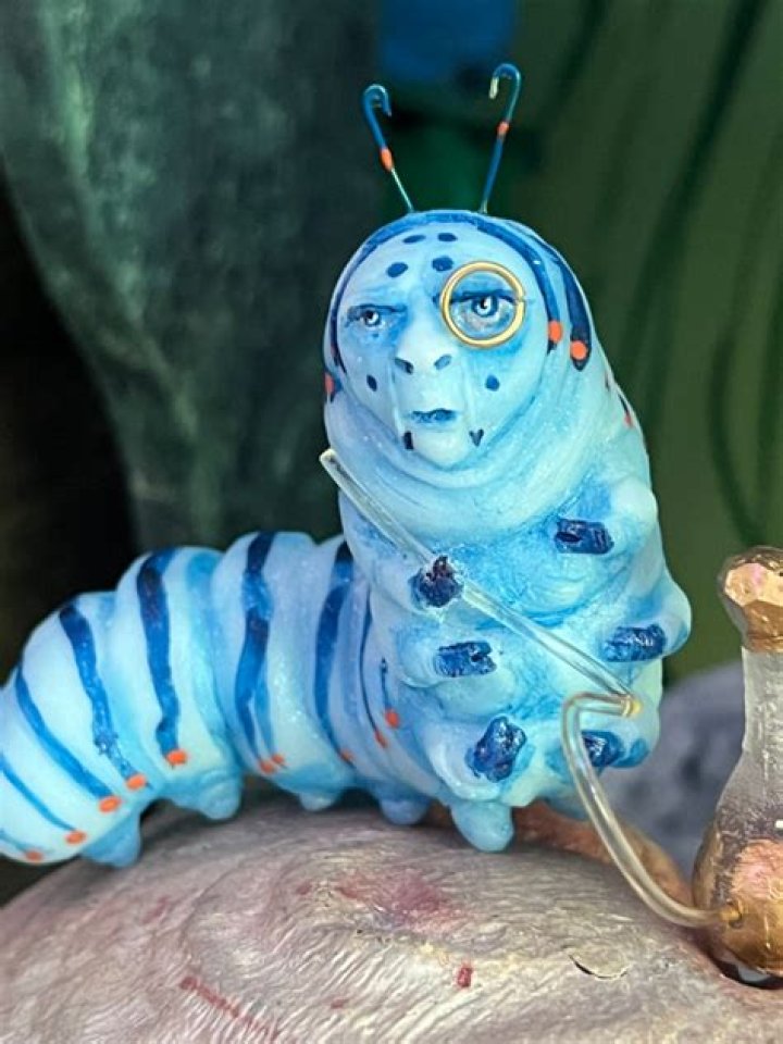 What does the blue Caterpillar represent in Alice in Wonderland? – Celebrity